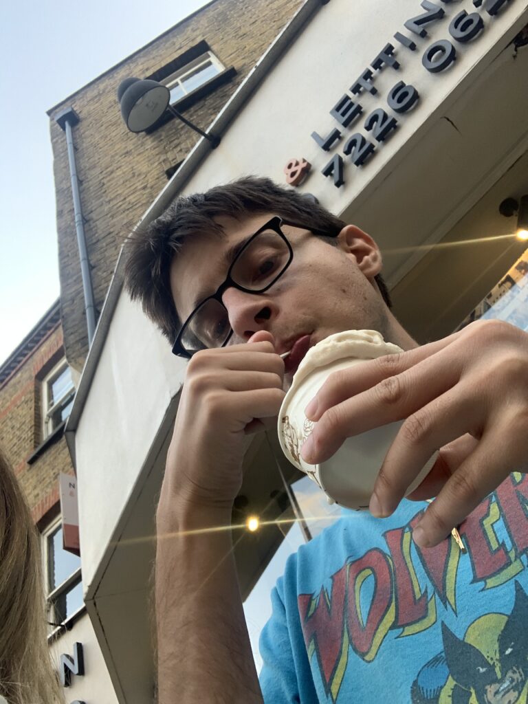 Young man eating ice cream