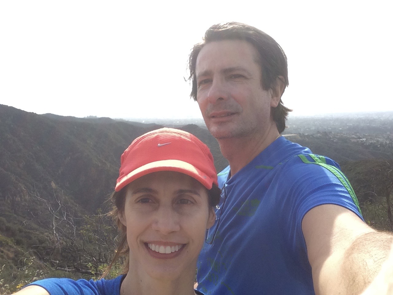 Man and woman taking selfie on a hike